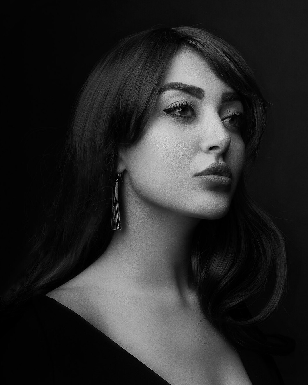 Studio portrait of a Turkish woman editor smiling